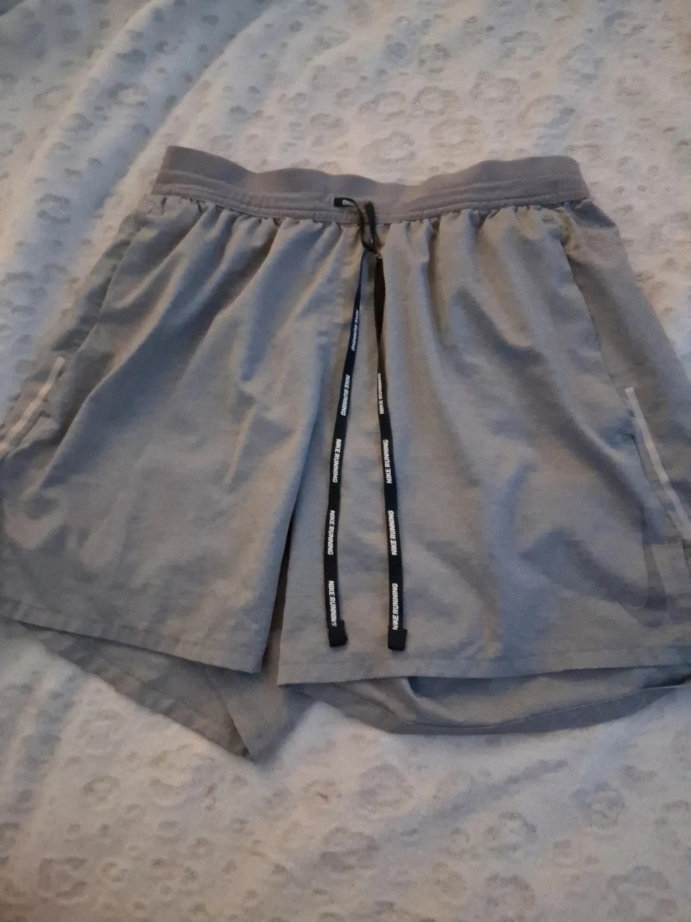 Nike Light Gray Women's Athletic Shorts with Black Drawstring